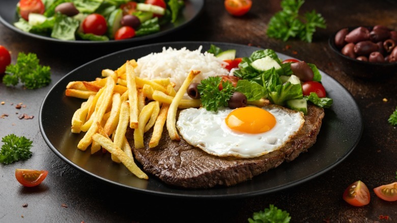 A plate of steak and eggs