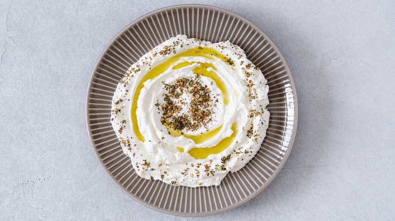 Bowl of labneh with olive oil