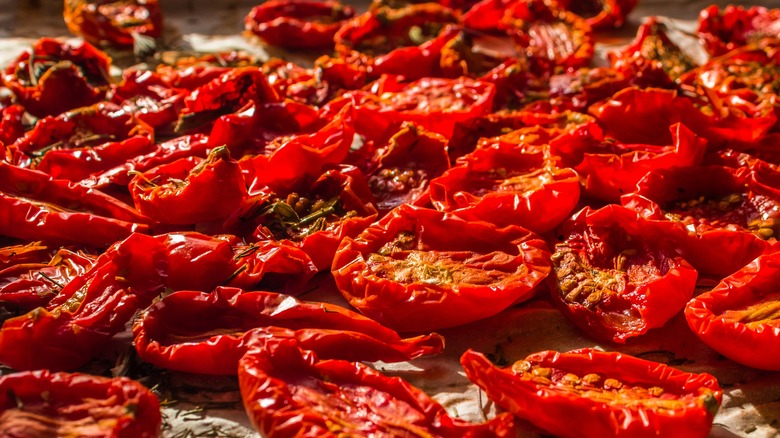 Crinkly, bright red sun-dried tomatoes