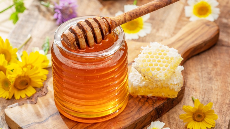 honey in jar and honeycomb