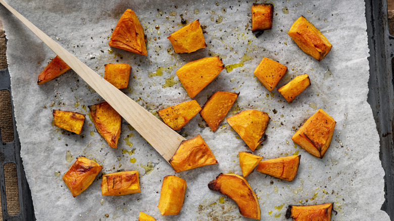 Pumpkin chunks on parchment paper 