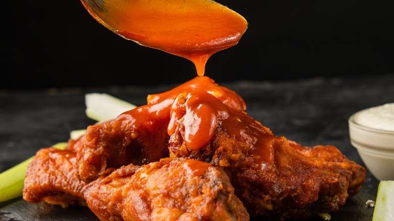 Buffalo sauce and chicken wings