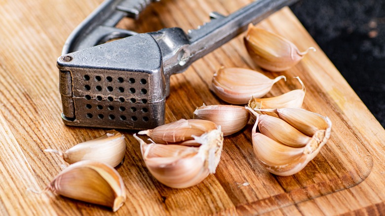 Using a garlic press