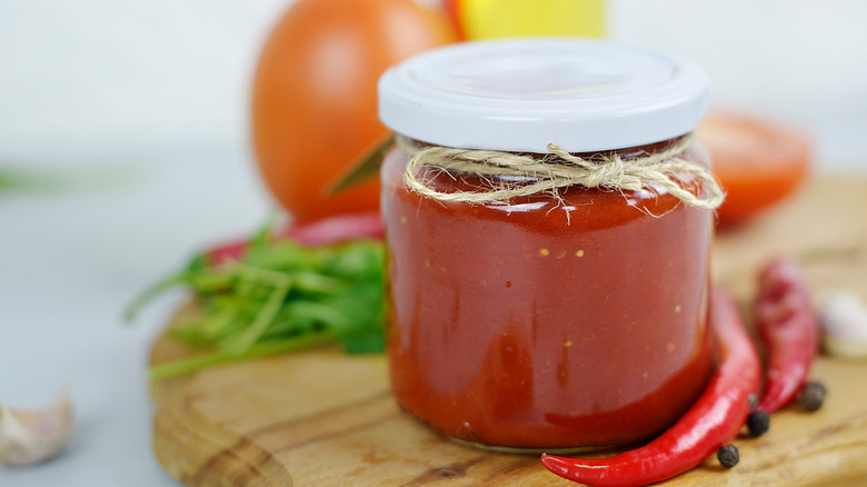 Jar of tomato salad dressing