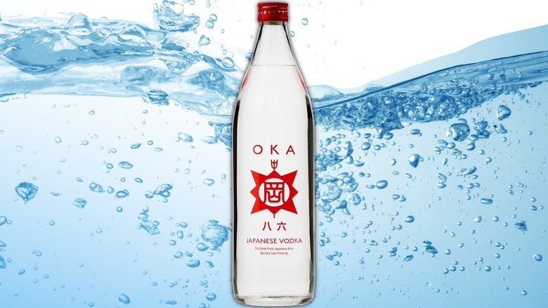 Bottle of Oka vodka on white background