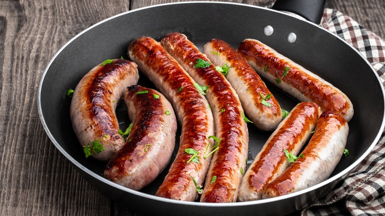 sausages crowded in pan