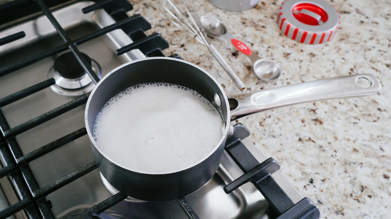 Milk boiling on stove