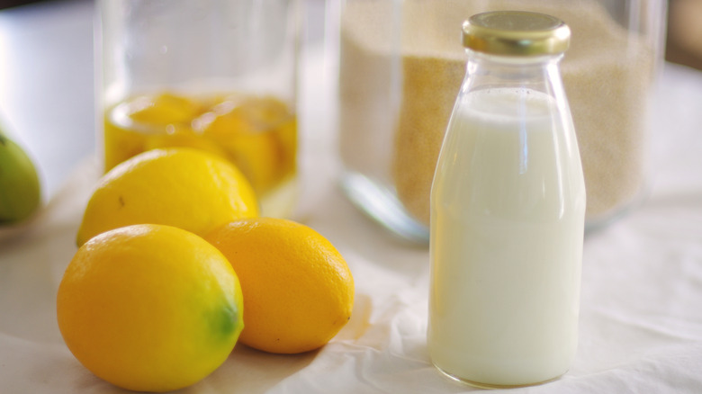 Bottle of milk with lemons