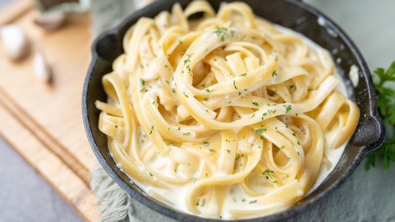 Fresh pasta in creamy sauce