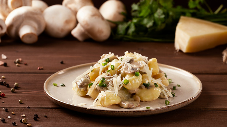 Gnocchi in cream sauce with vegetables