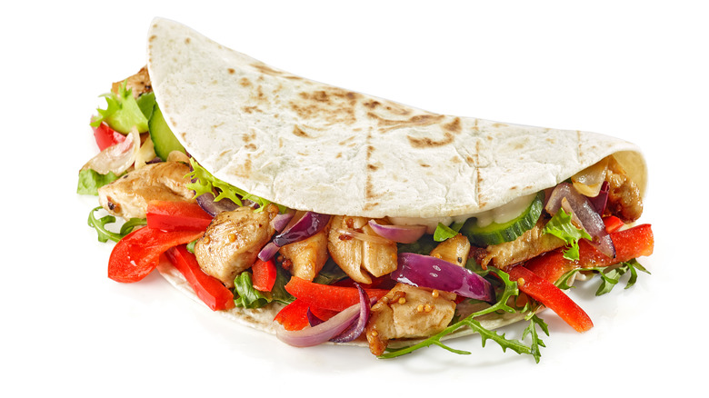 Vegetables and chicken in tortilla