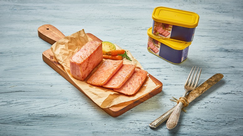 sliced meat on cutting board