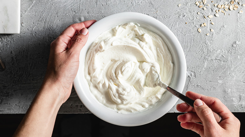 mixing cream in bowl