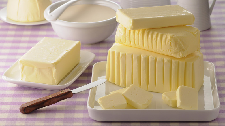 stacks of butter with knife