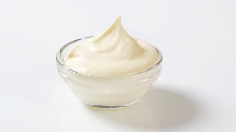 Sour cream in glass bowl