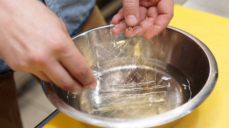 Gelatin sheets in water bowl