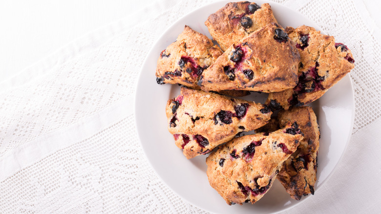 Berry scones on white plate