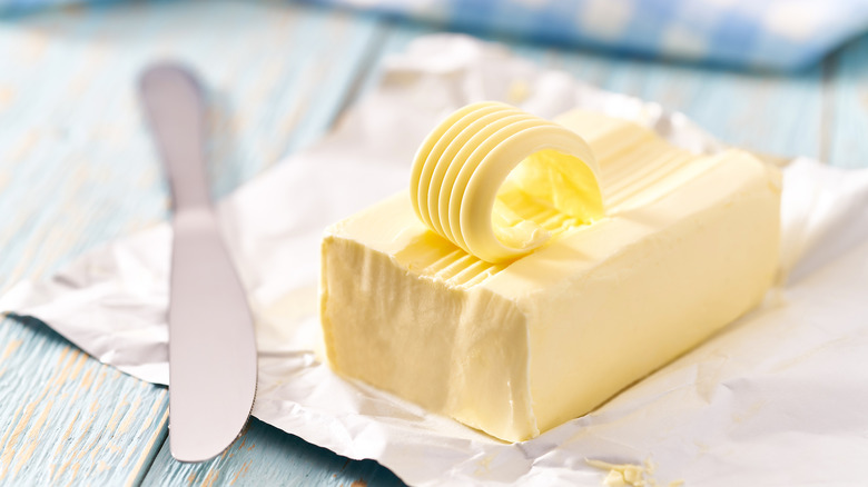 Butter on table with knife