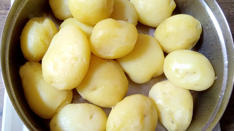 strained potatoes in a pot