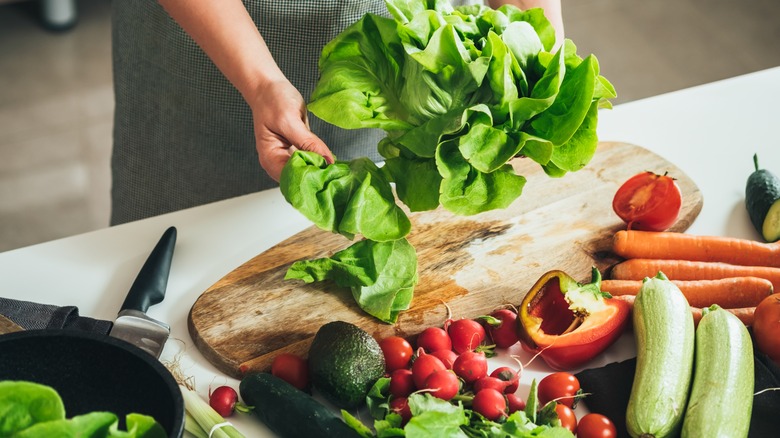 preparing vegetables for salad