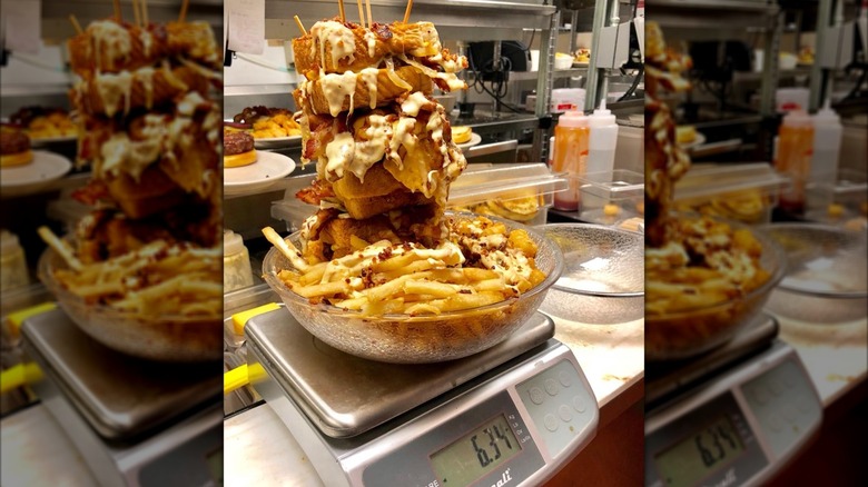 The Coronary Bypass Burgers at The Vortex in bowl on scale