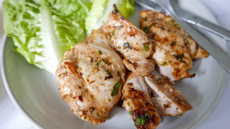 Chicken plated with lettuce leaves