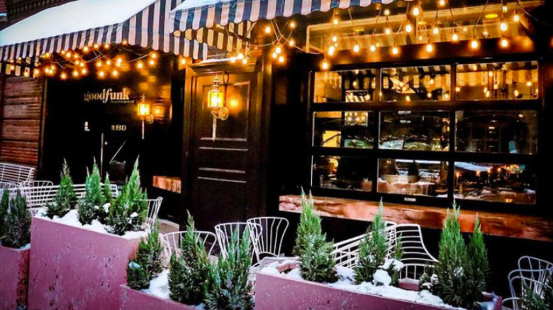 outdoor bar strung with lights