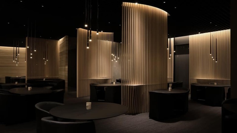 Minimalist dark and beige interior of Ever Restaurant