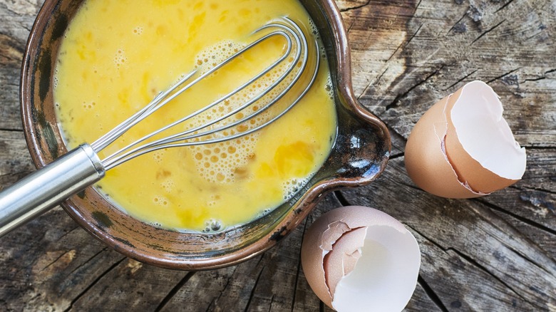 Whisking eggs in a bowl