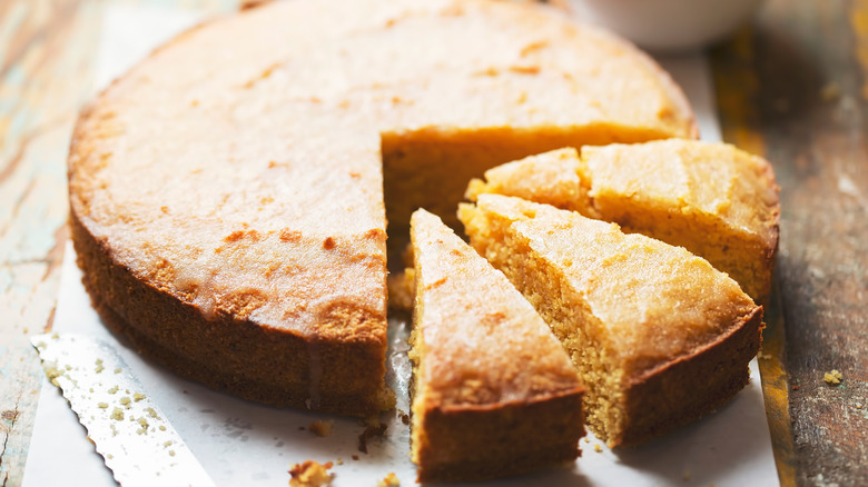 sliced lemon and polenta cake knife