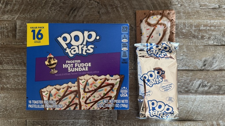 Frosted hot fudge sundae Pop-Tart box next to unwrapped pop-tart