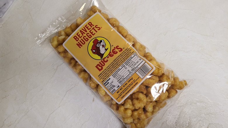 Bag of Buc-ee's beaver nuggets on a white table