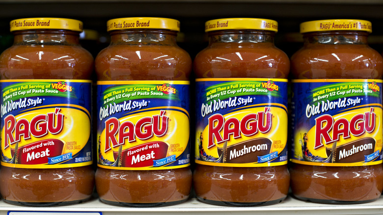 four ragu brand sauce jars