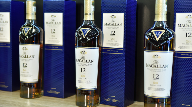 Several Macallan scotch bottles displayed