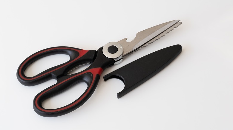 Kitchen shears on white surface