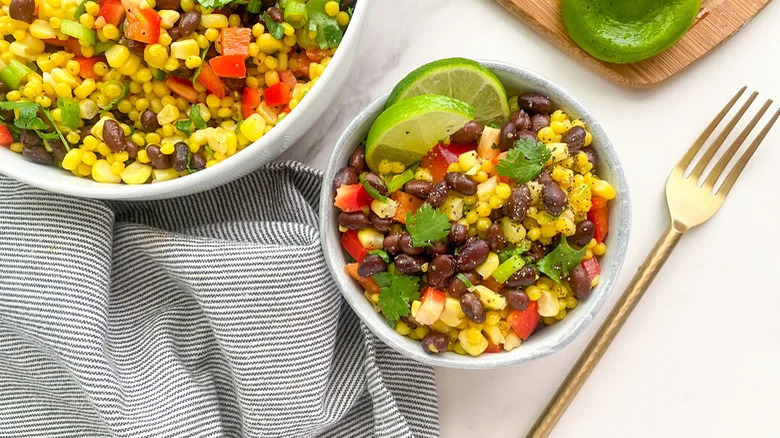 Couscous salad with lime wedges