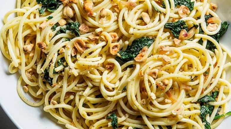 Spaghetti Carbonara With Kale And Hazelnuts