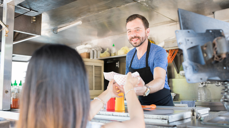 Concession stand man without hairnet