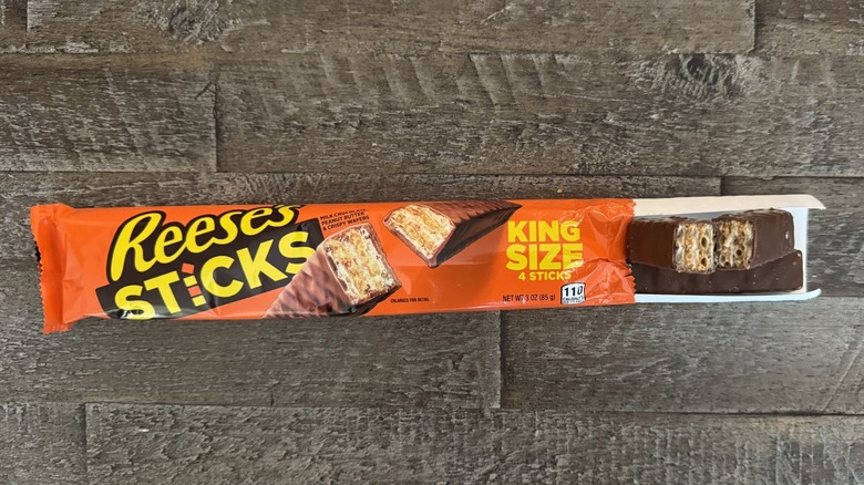 Reese's Sticks candy on wooden surface