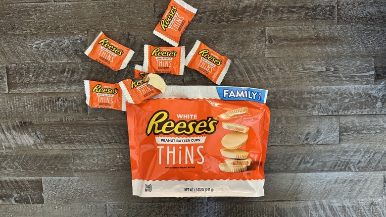 Reese's white chocolate thins on wooden surface