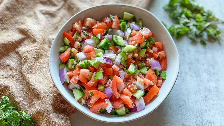 tomato cucumber salad in bowl