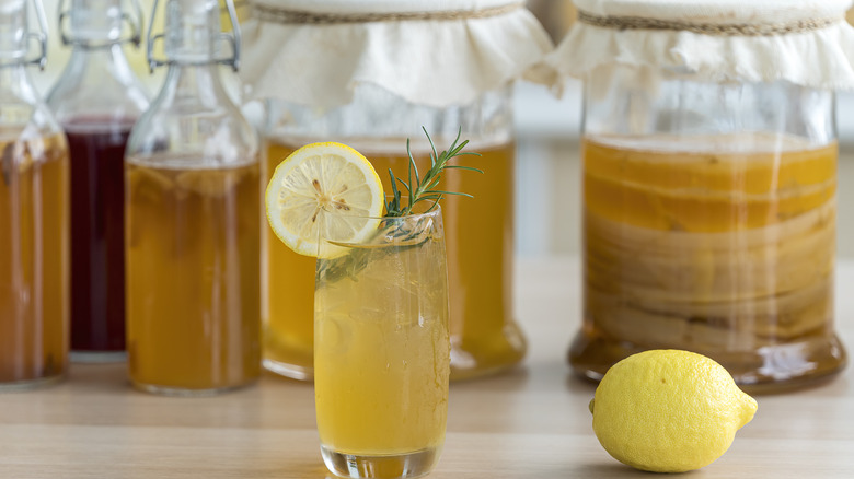 Jars and a glass of kombucha