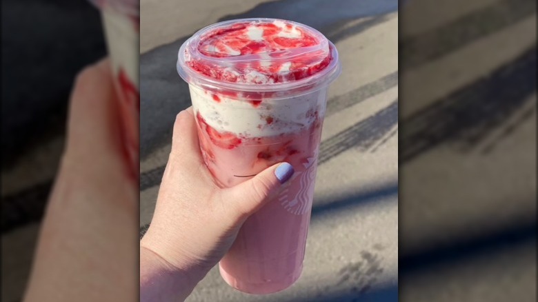Beverage with strawberries on top