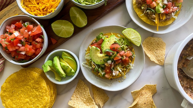 pinto bean tostada with accompaniments