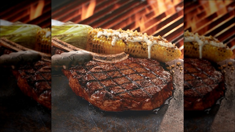 Outlaw ribeye steak and corn