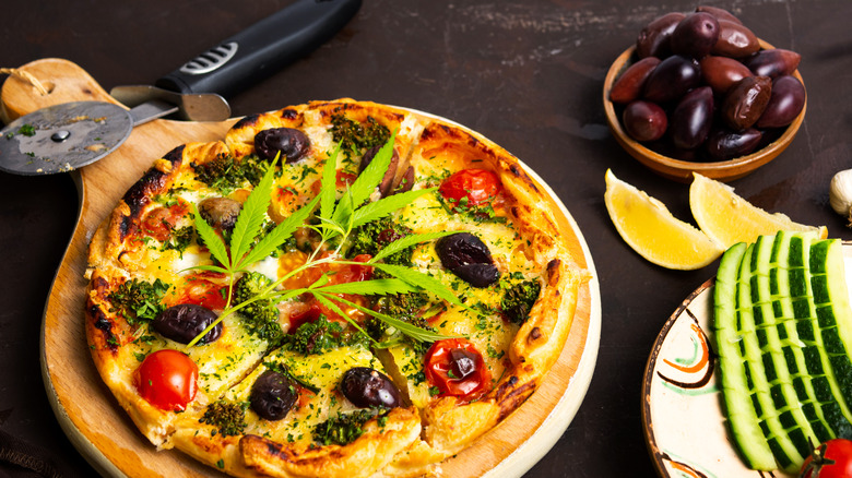 Cannabis pizza with marijuana leaf