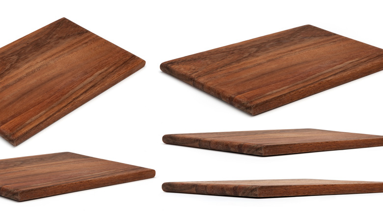 assorted wooden cutting boards