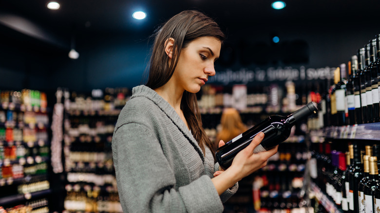 Person shopping for alcohol