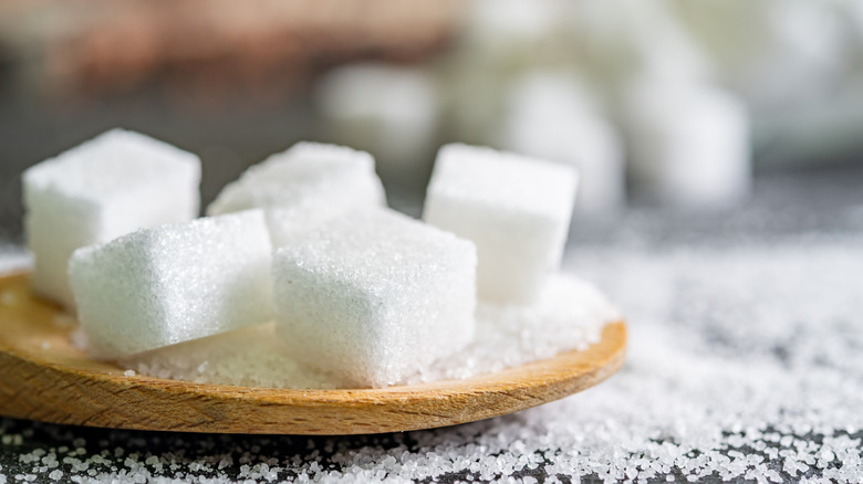 Organic sugar cubes on table