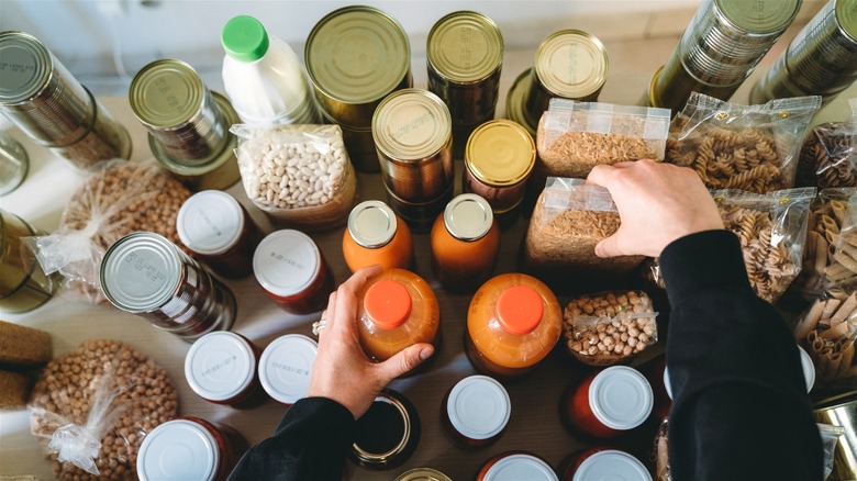Rearranging non-perishable cans and jars
